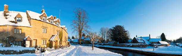 istock Idyllic winter village snowy cottages 155386087