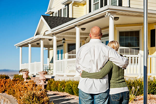Young Couple Admiring Their New Home