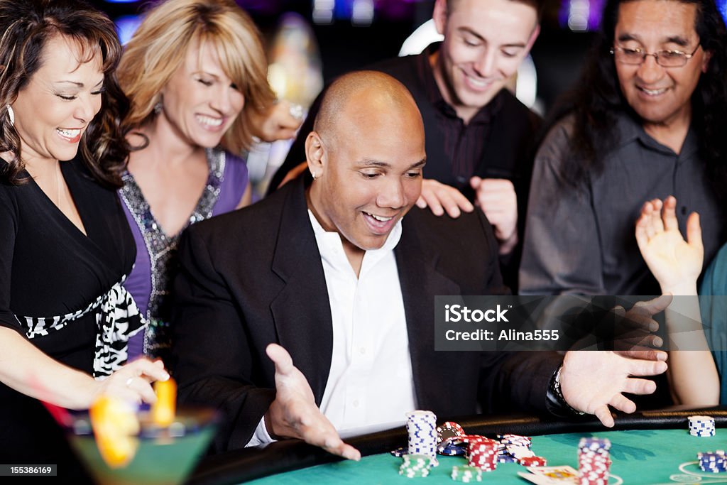 Excited winner at the blackjack table  Casino Stock Photo