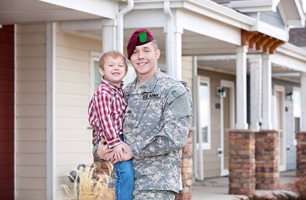 istock Real American soldier and son smiling outdoor 155386576
