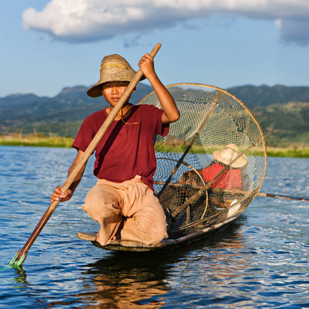 istock Young fisherman on Inle Lake, Myanmar 155386765