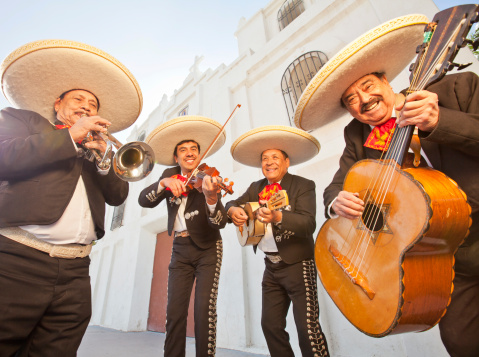 Hispanic Musicians playing Mariachi music