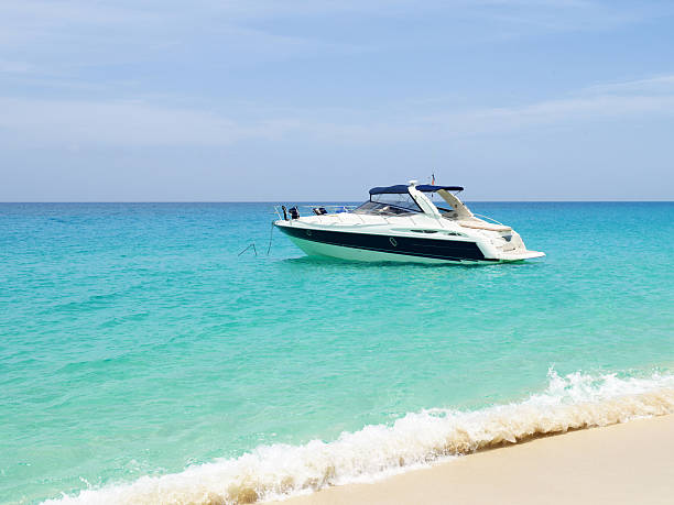 istock Luxury beach scene with yacht on water 155386972