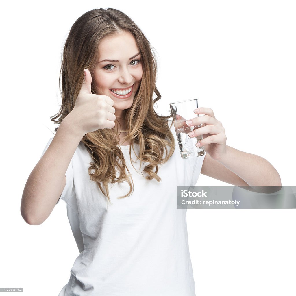 brunette Jovem e Bela mulher segurando um copo de água - Foto de stock de Adolescente royalty-free