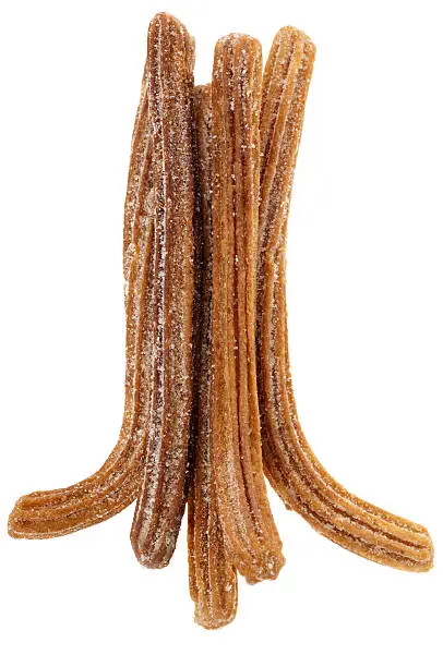 A pile of churros, isolated on white. Churros are a famous deep fried pastry in Spain and Mexico.