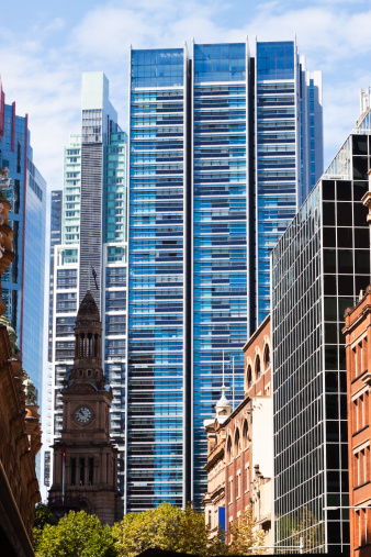 Downtown Sydney Australia with old and new office buildings and skyscrapers, full frame vertical composition