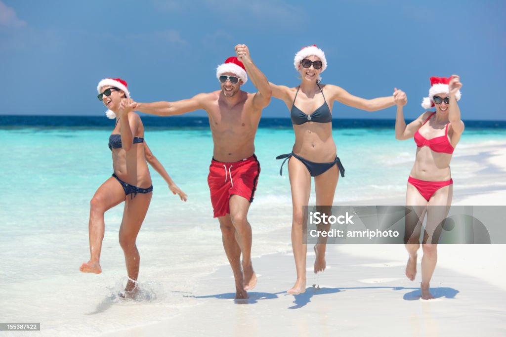 Funny People Christmas Hats Beach Stock Photo - Download Image Now - Adult, Beach, Bikini - iStock Funny People Christmas Hats Beach Stock Photo - Download Image Now - Adult, Beach, Bikini - iStock