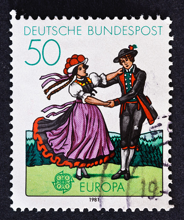 German stamp from 1991 featuring dancers in traditional costume of the Black Forest.