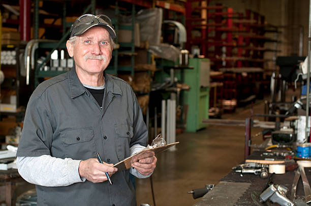 Senior Adult Manufacturing Employee stock photo