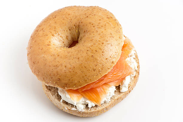 Bagel with cream cheese and smoked salmon  smoked salmon stock pictures, royalty-free photos & images