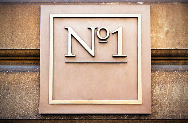 istock Square brass house number with 