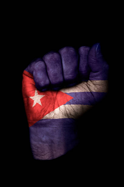 Image of a clenched fist with the flag of Cuba on it