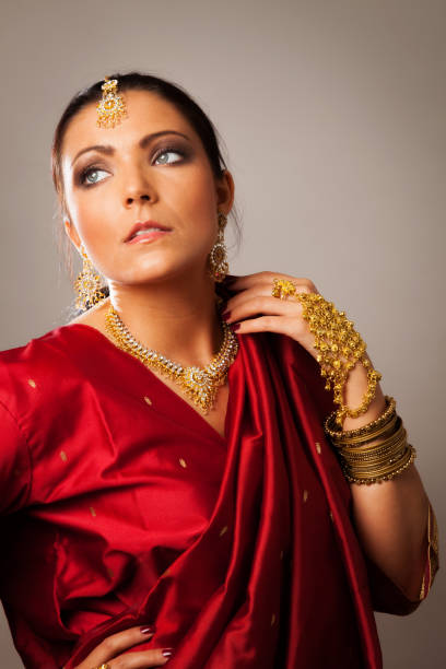 istock young woman wearing bollywood-style sari 155391034