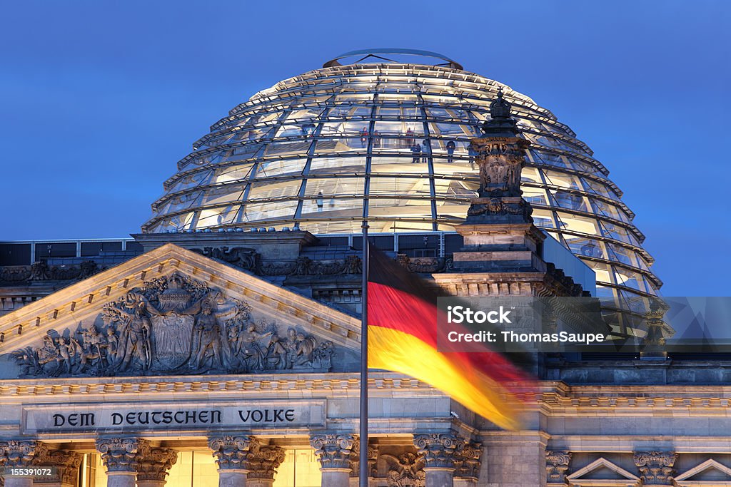 Looking up at Reichstag Dome illuminated Detail of the Reichstag in Berlin at dusk. Germany Stock Photo