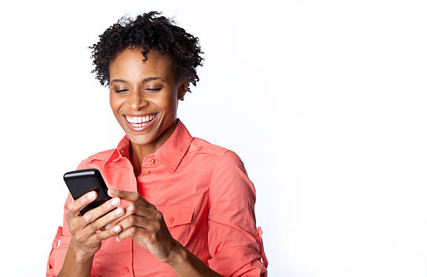 istock laughing woman on cell phone 155391174
