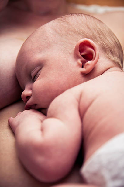 istock Newborn Baby and Mother Together 155391343