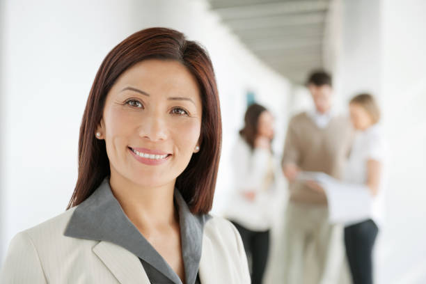 istock Asian businesswoman portrait at work 155391712