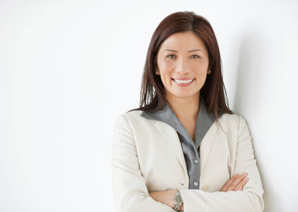 matura donna d'affari asiatiche felice - business person isolated on white waist up business foto e immagini stock