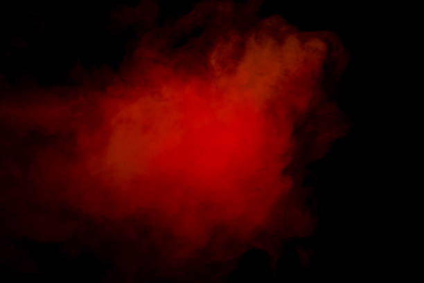 istock Orange and red steam on a black background. 1553919577