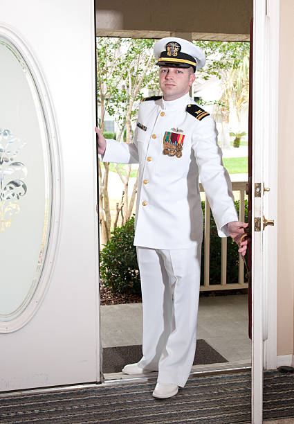 istock Caucasian Formally Dressed Naval Officer Coming Home 155391981