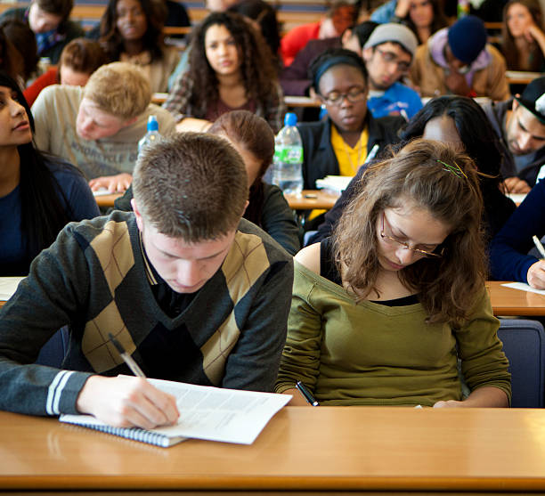 University student in lecture room. stock photo