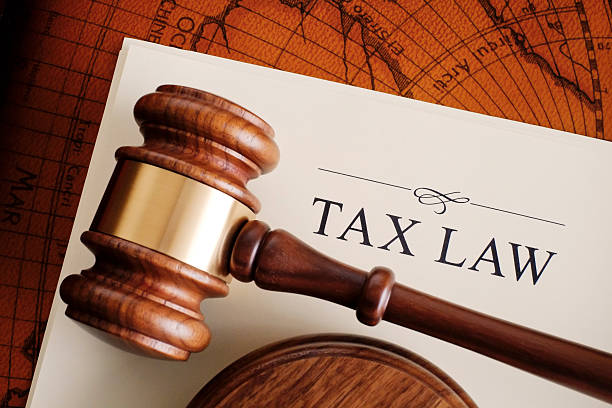 istock Brown gavel on a white tax law document 155392441