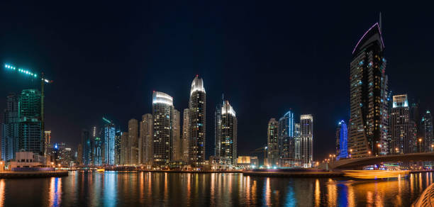 istock Neon highrises futuristic cityscape Dubai Marina 155392548