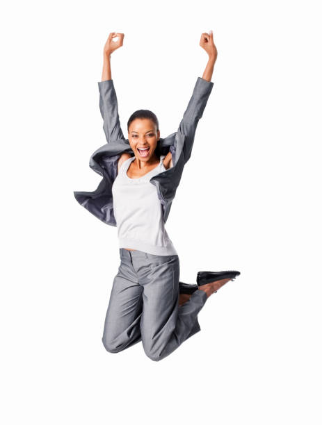 Excited Businesswoman Jumping - Isolated