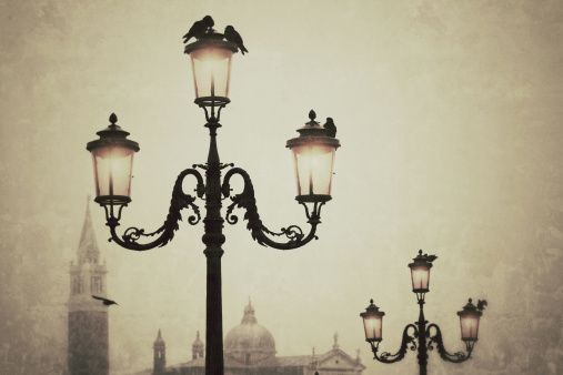 Murano glass street lamp at Venice under fog