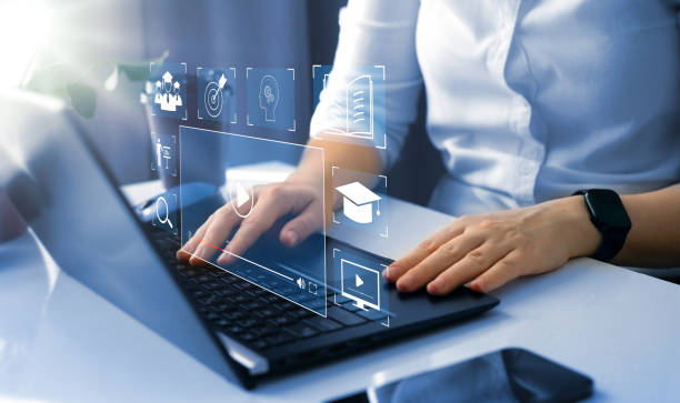 istock E-learning education, internet lessons and online webinar. Person who attends online lessons on a digital screen.Education internet Technology. 1553926995