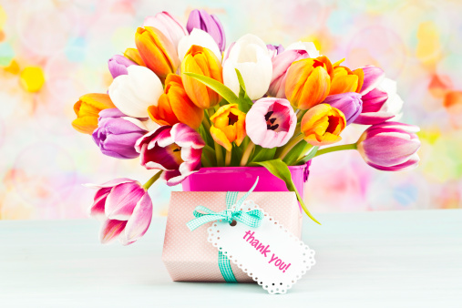 Bouquet of tulips with thank you gift