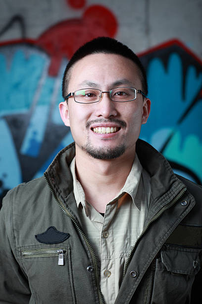 istock Chinese male youth Painting graffiti 155392868