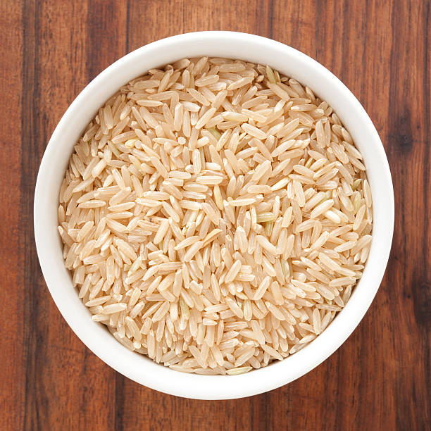 arroz integral - rice food processed grains bowl - fotografias e filmes do acervo