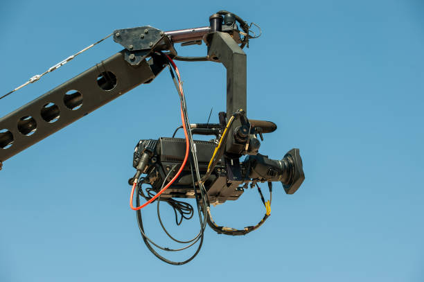 istock Camera attached to Jimmy Jib in the open sky 1553929780
