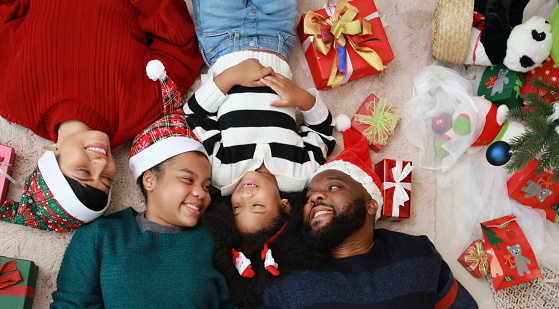 Portrait Happy family lying on back , selfie photo shooting Christmas celebration