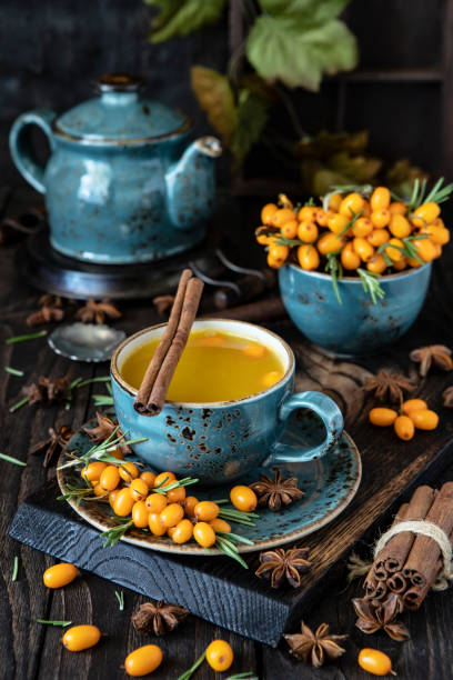 istock Sea buckthorn hot tea, autumn drinks concept 1553930569