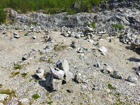 Summer scene in high mountains, rocks with high peaks in background