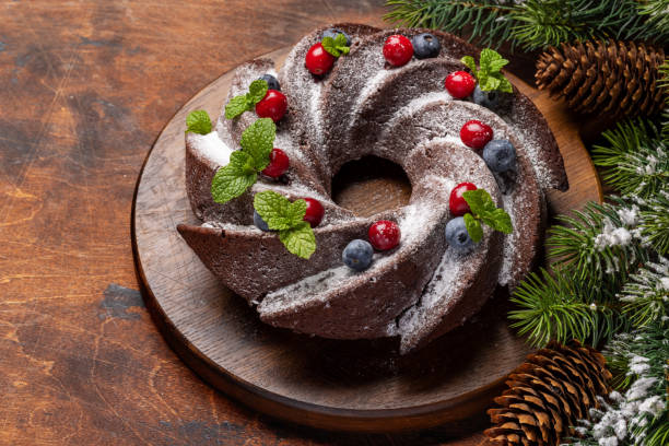 istock Christmas cake with blueberries, cranberries and mint 1553930767