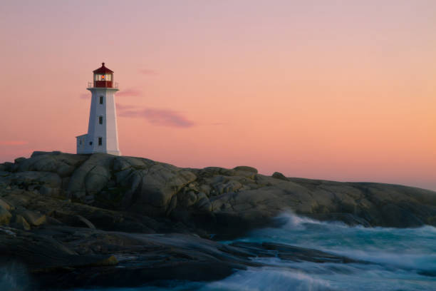 istock Peggy`s Cove Lighthouse at Dusk 155393638