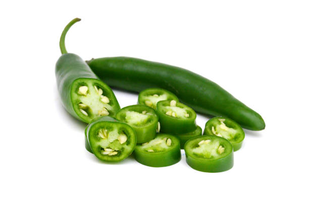 istock fresh green cut chili pepper pieces on a white background 1553943742