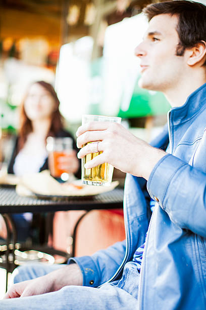 istock Couple Drinking at Outdoor Pub 155394742