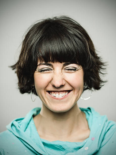 Real young woman. Real young spanish woman portrait laughing. cheesy grin stock pictures, royalty-free photos & images
