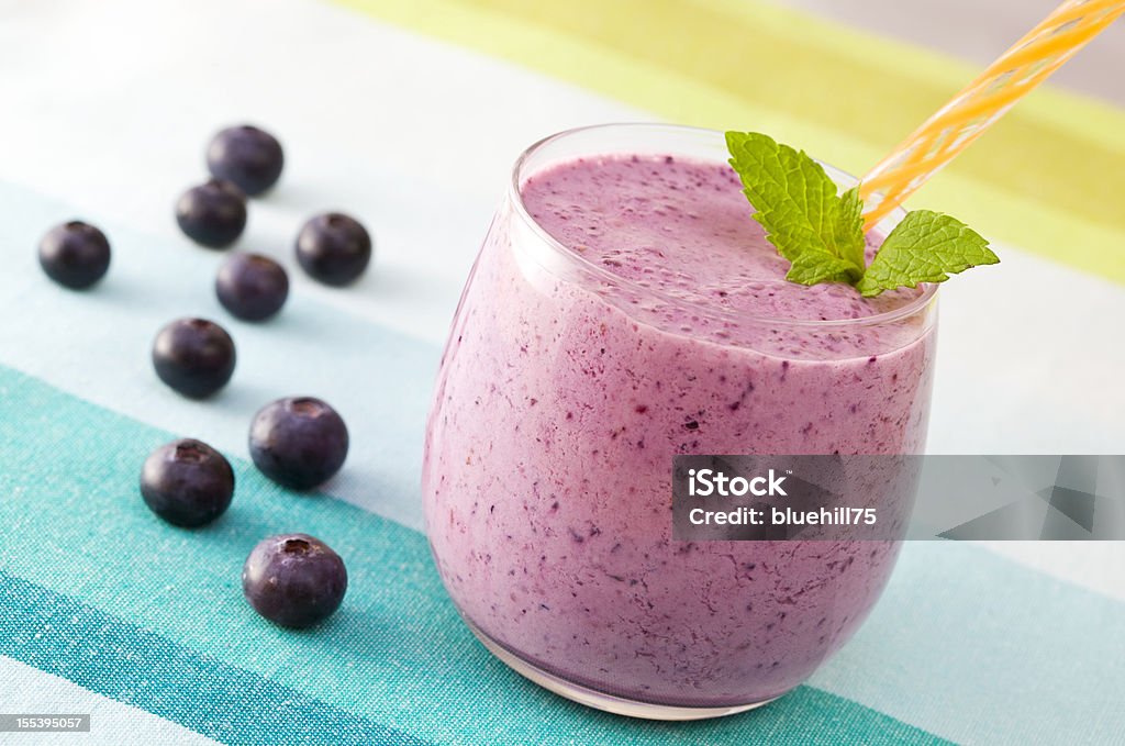 Berry smoothie Berry smoothie with fresh mint leaf close up Juice - Drink Stock Photo