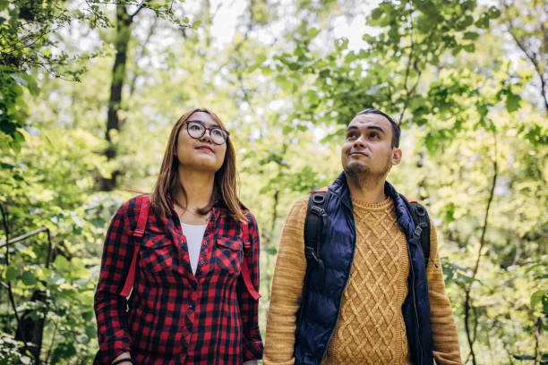 istock Man and woman in nature 1553950578