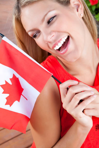 istock Young female celebrating Canada's Day 155395208