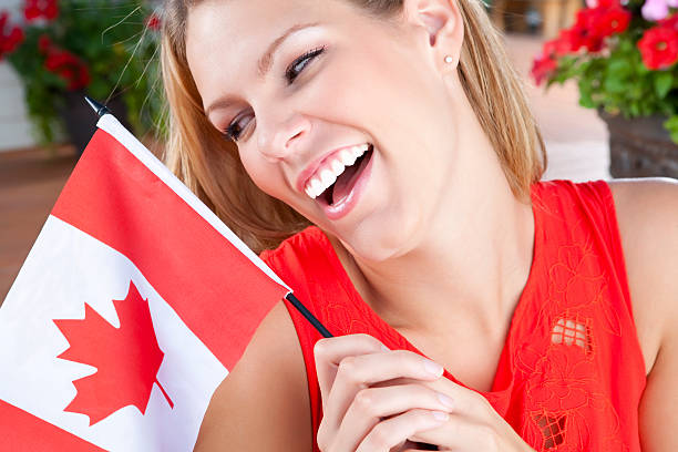 istock Young female celebrating Canada's Day 155395261