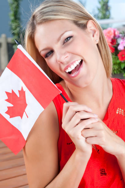 istock Young female celebrating Canada's Day 155395273