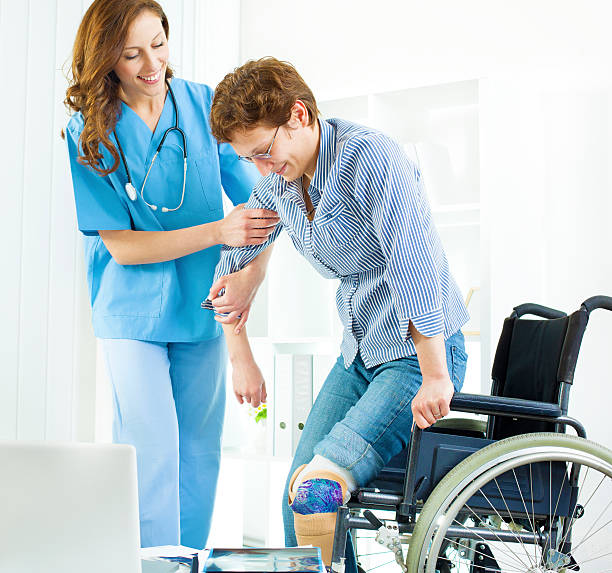 istock Disabled Woman At Doctors Office. 155395401