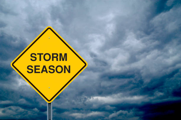 istock Caution Sign in Front of Storm Clouds 155395605