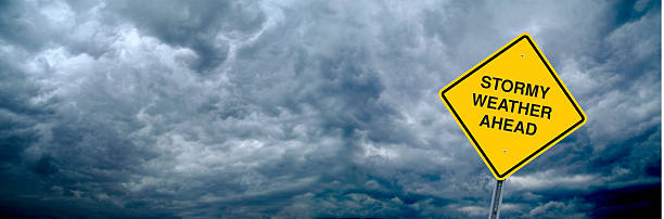 Stormy Weather A Caution Sign in Front of Storm Clouds Warning of Stormy Weather Ahead. Ultra wide angle/Panoramic view can also be used for billboard applications. ominous photos stock pictures, royalty-free photos & images